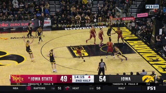 Brock Harding finds Owen Freeman inside for the slam, extending Iowa